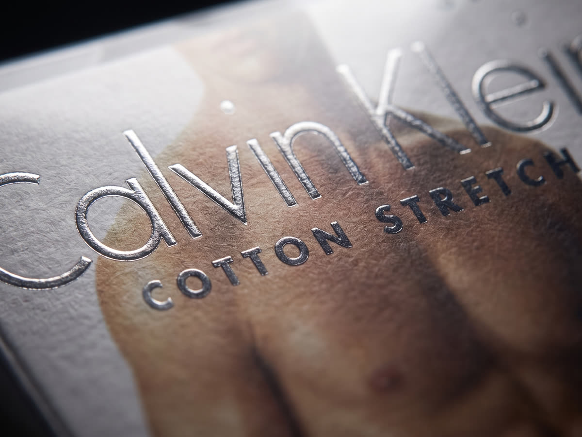 Macro of foil-stamped text on an apparel carton