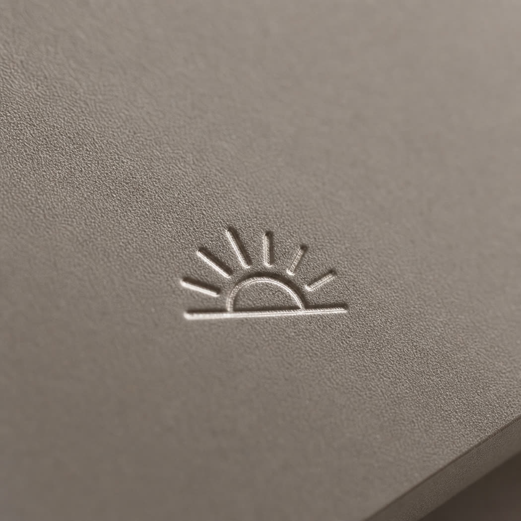 Macro detail of soft-touch lamination texture on taupe board