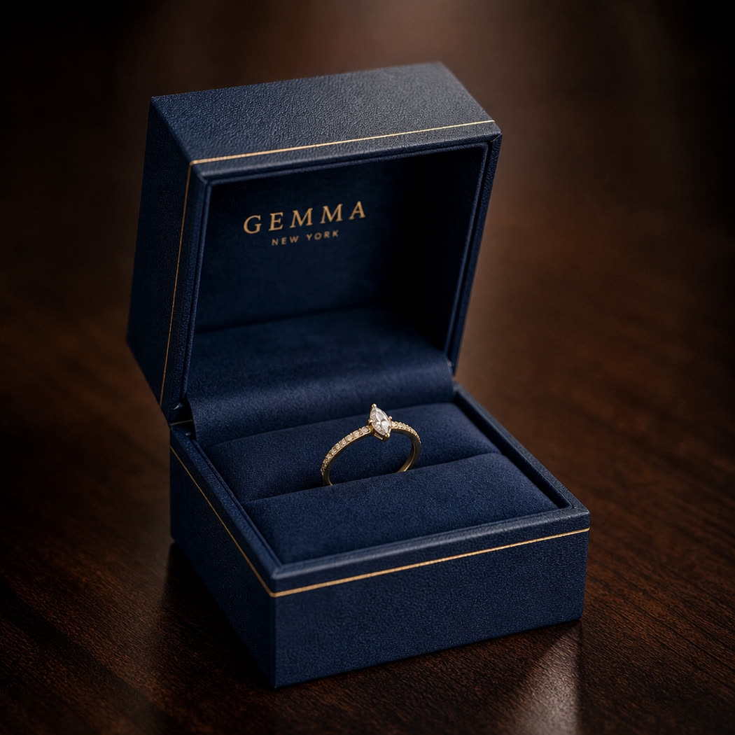 Close view of a ring seated in a rigid box insert