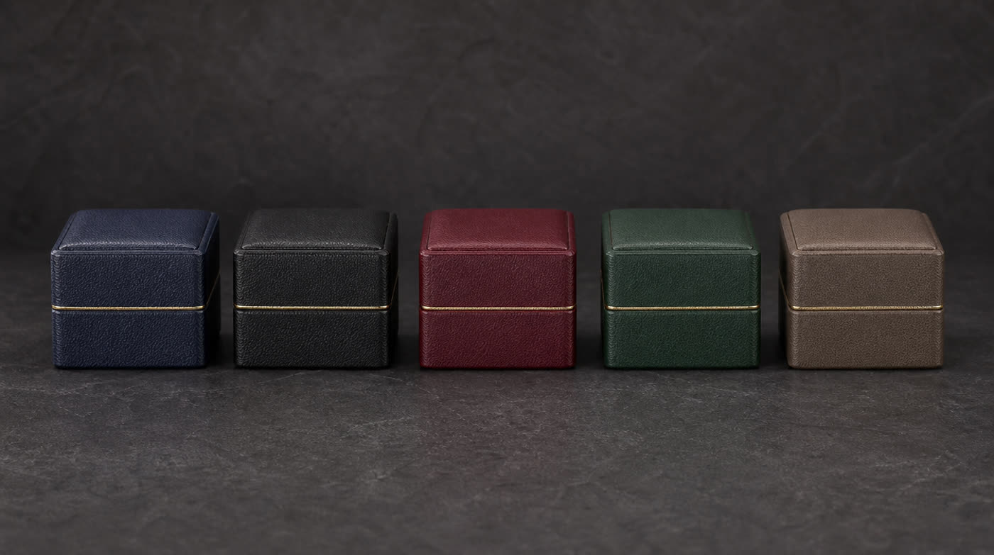 Five jewelry and watch boxes in different leather colourways