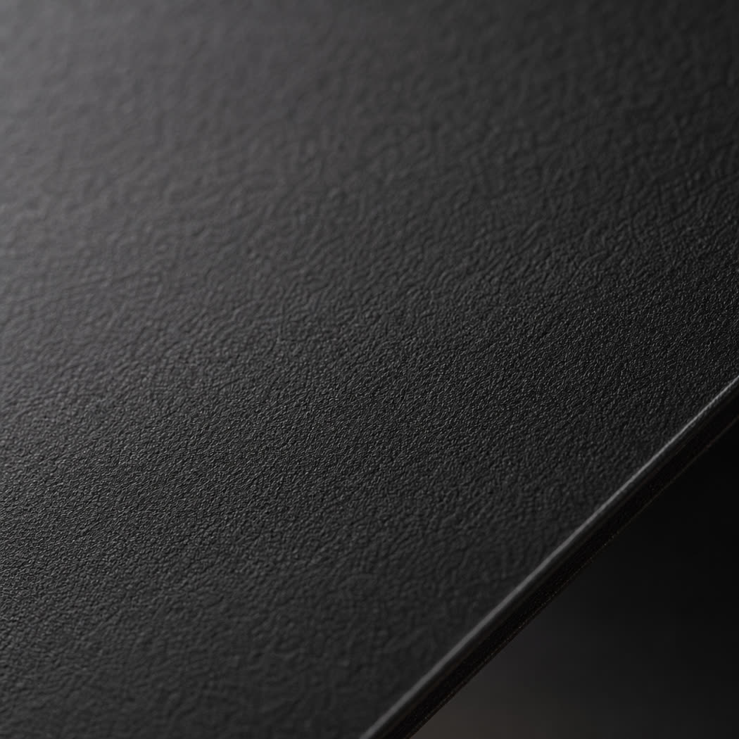 Macro detail of matte soft-touch lamination texture
